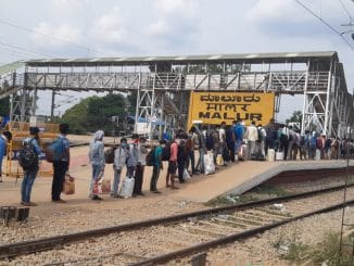 Migrant Workers of Bangalore queuing up to travel home from Malur Station on Shramik Trains