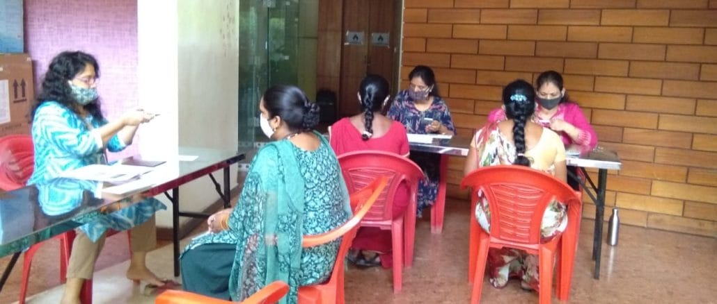 A help desk for filing domestic workers' applications, organised at Mantri Greens apartment on July 2