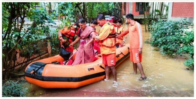 Disaster response teams assist residents of flooded locality in Bangalore