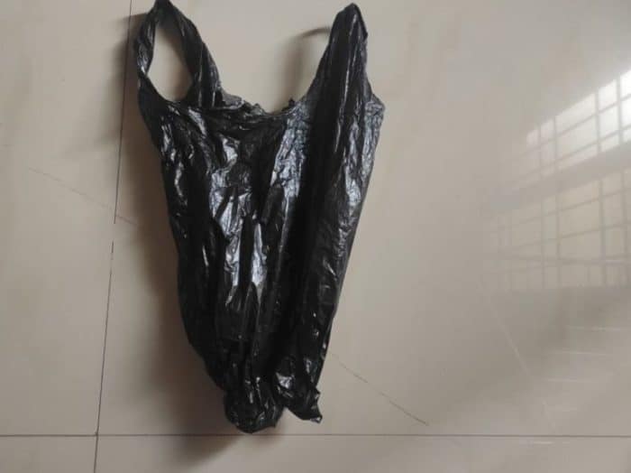 black plastic bag used by meat vendors